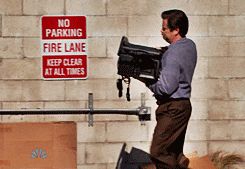 A gif of Ron Swanson throwing his computer into a dumpster