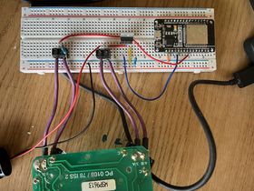 A top-down photograph of the circuit setup on the breadboard, as described in the paragraph that follows.