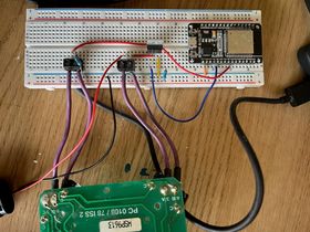 A top-down photograph of the circuit setup on the breadboard, as described in the paragraph that follows.