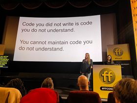 Jess and Eda on stage at FFConf in front of a slide that says "Code you did not write is code you do not understand.
You cannot maintain code you do not understand."
